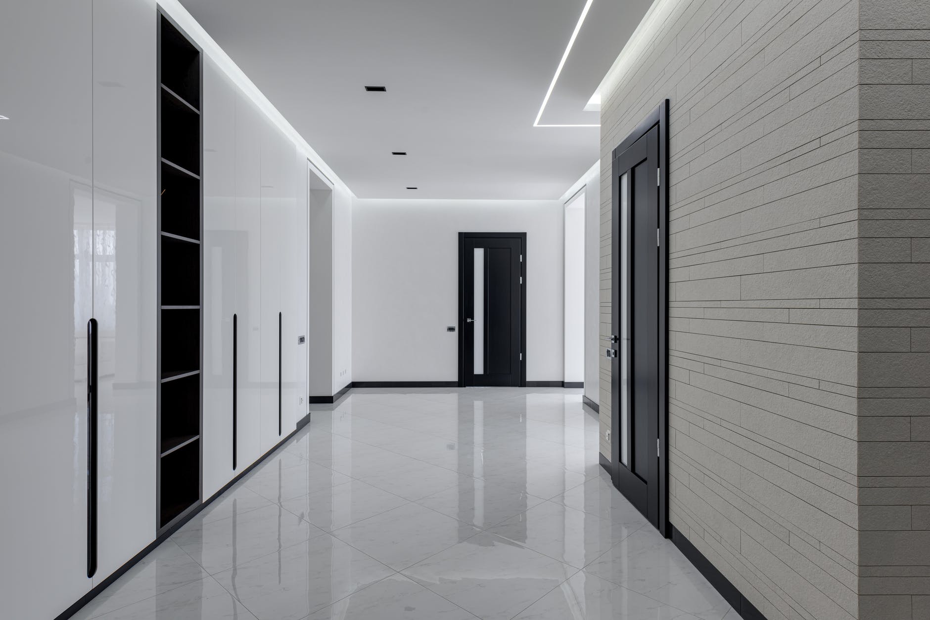 big hall in minimalistic style in modern apartment building